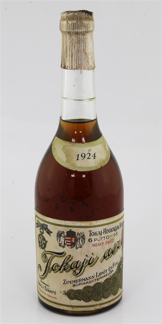 A half litre bottle of 1924 Zimmerman Tokaji Aszu 6 Puttonyos (level base of neck).